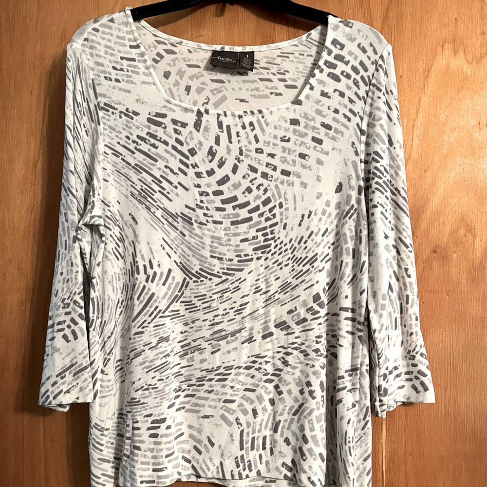 Travelers by Chico. Shades of grey and silver on white. Long sleeve.